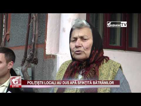 POLIȚIȘTII LOCALI AU DUS APĂ SFINȚITĂ BĂTRÂNILOR