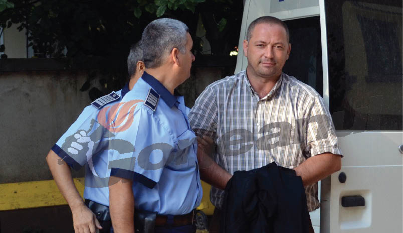 Troacă, după gratii