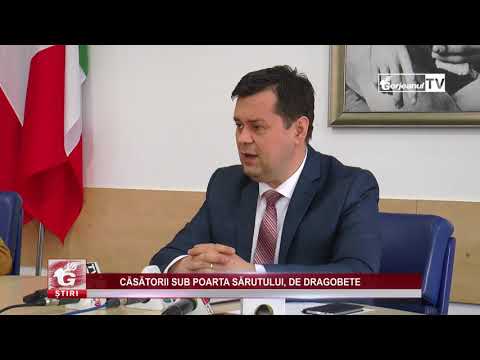 CĂSĂTORII SUB POARTA SĂRUTULUI, DE DRAGOBETE