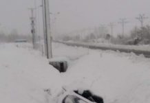 Mașină căzută în șanț dar camuflată de zăpadă, pe E79 Târgu-Jiu – Bumbești-Jiu