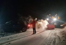 FOTO: BMW X 5 scos din șanț de drumarii gorjeni! Avea cauciucuri de vară!