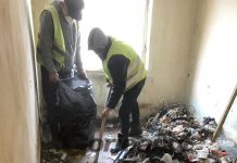 Tone de gunoaie într-un apartament din zona „Diana”