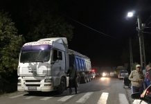 Scandal la Slivilești. Primarul, revoltat pe polițiști după confiscarea unui camion de lemne!