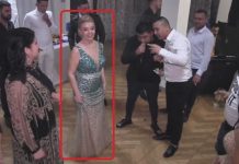 VIDEO: Fiica managerului Tîrziu, moașă la un botez de rromi în Târgu-Cărbunești!