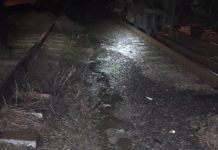 Dosar penal în Gara Târgu-Jiu! Vagon cu ulei, desigilat de un boschetar, 200 de litri pe calea ferată