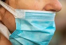 Amendată lângă casă pentru masca purtată sub nas