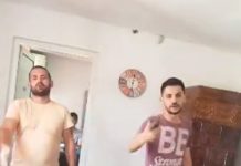 VIDEO: Polițist prins cu țigara aprinsă în sediul instituției! Un cetățean a făcut scandal